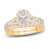 Thumbnail Image 1 of Diamond Halo Bridal Set 1-1/2 ct tw Oval/Round 14K Yellow Gold