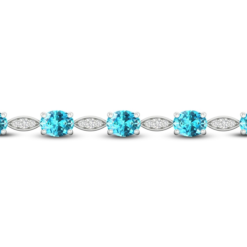 Natural Swiss Blue Topaz Bolo Bracelet 1/15 ct tw Diamonds 10K White Gold