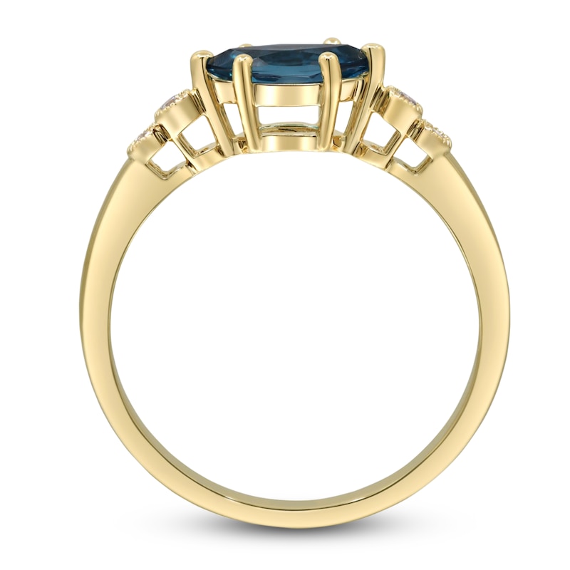 Main Image 2 of Natural Blue Topaz Ring 1/20 ct tw Round 14K Yellow Gold