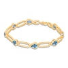 Thumbnail Image 1 of Kallati Pear-Shaped Natural Blue Topaz Bracelet 1/15 ct tw Diamonds 14K Yellow Gold 7&quot;