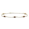 Thumbnail Image 1 of Oval-Cut Natural Garnet & Diamond Station Bracelet 1/15 ct tw 10K Yellow Gold 7.25&quot;