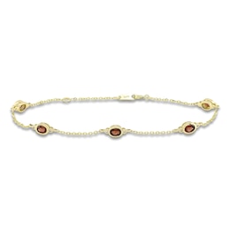 Oval-Cut Natural Garnet & Diamond Bezel-Set Bracelet 1/20 ct tw 10K Yellow Gold 7.25&quot;