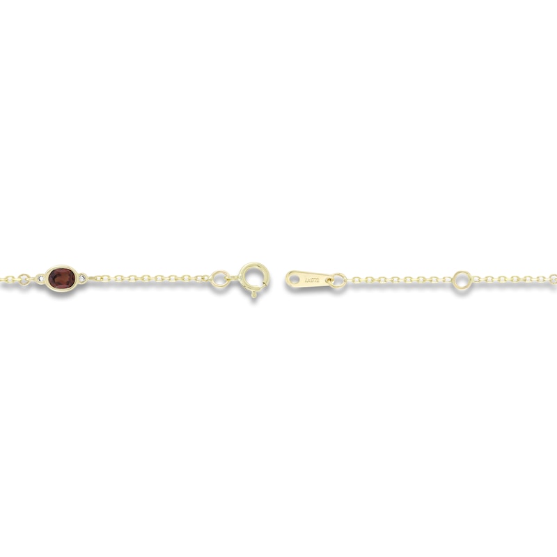 Main Image 2 of Oval-Cut Natural Garnet & Diamond Bezel-Set Bracelet 1/20 ct tw 10K Yellow Gold 7.25&quot;