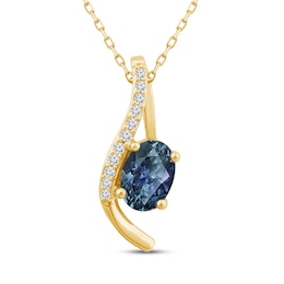 Montana Blue Oval-Cut Natural Sapphire Pendant Necklace 1/15 ct tw Round Diamonds 10K Yellow Gold 18&quot;